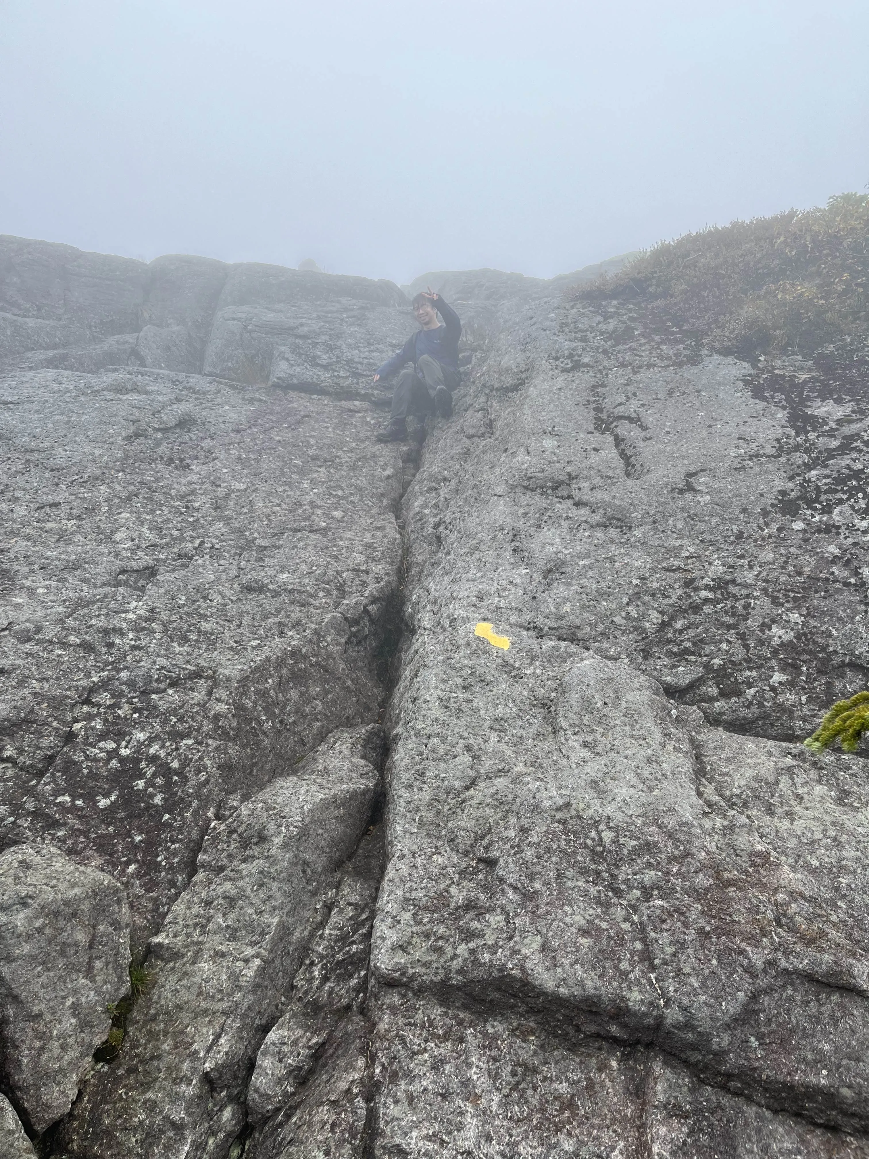 rock scramble in the fog