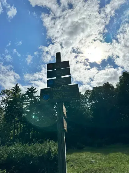 Sign pointing the wrong way to Mount Haystack